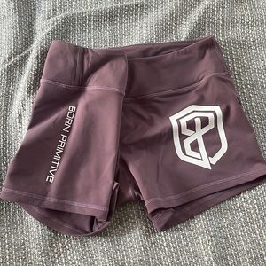 Light purple/dusty rose Born Primitive workout shorts 2.5” inseam